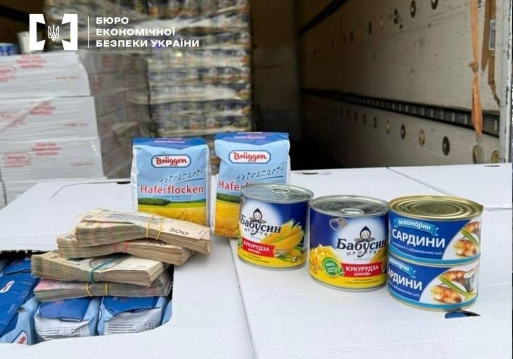 У передмісті Києва ділки  виготовляли фейкові консерви та вівсянку на мільйони гривень